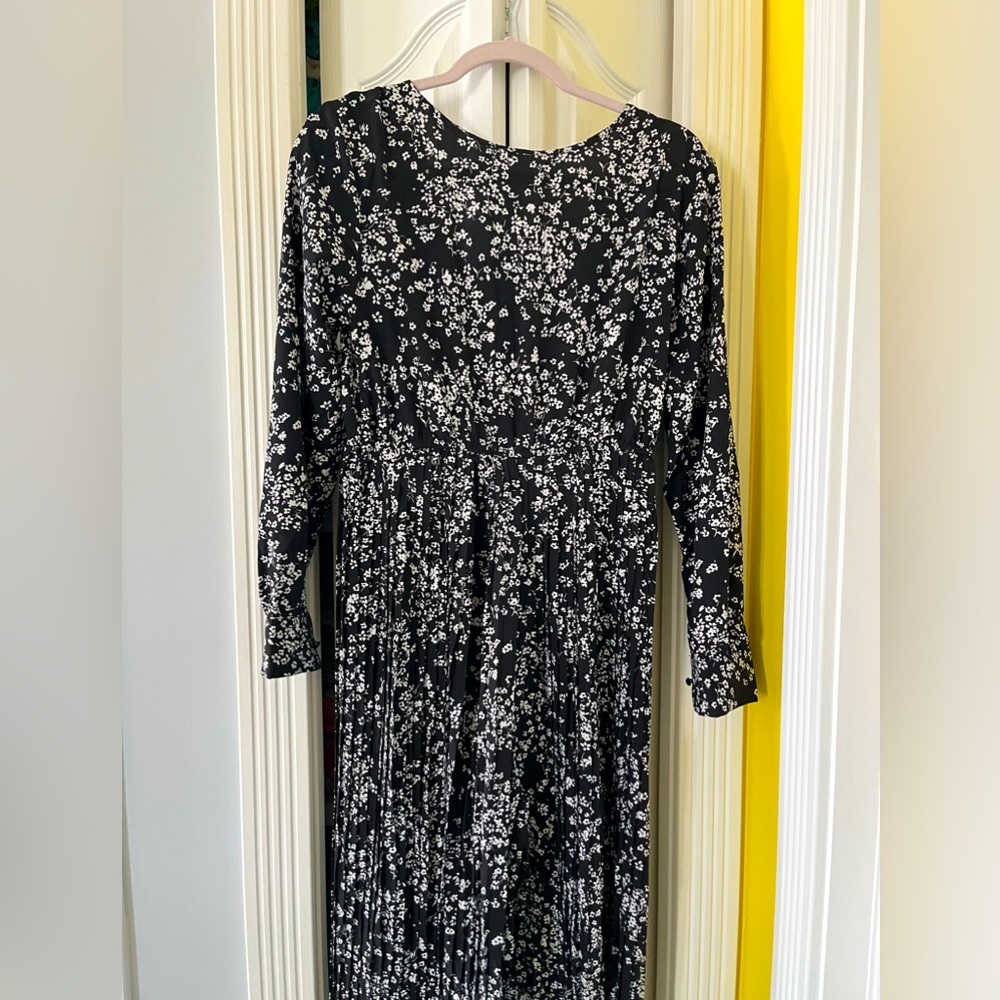Pleated black/ white jumpsuit with cross body front , floral pattern